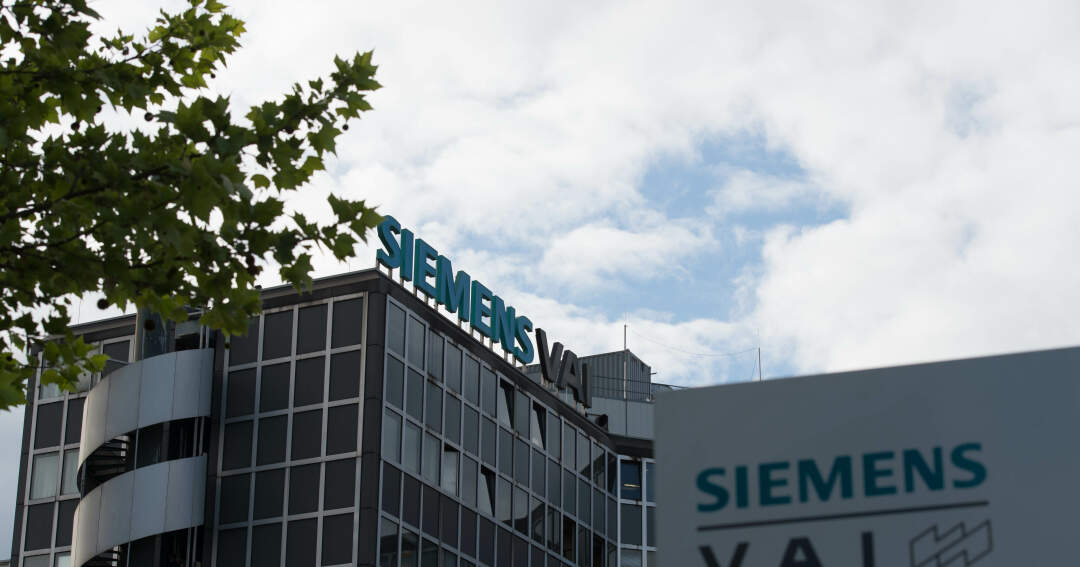 Titelbild: Protestfußmarsch von Siemens-VAI-Mitarbeitern